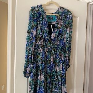 Floral dress with bell sleeves and v cut